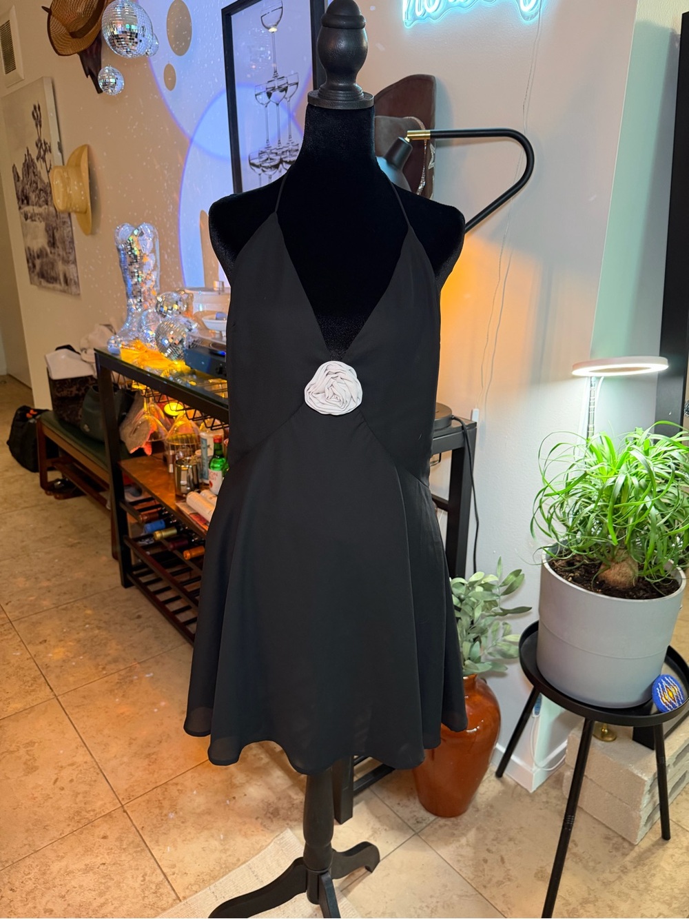 Black Halter Mini Dress with White Rosette Accent
